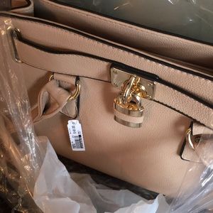 Call It Spring convert. nude bag w/ black accents